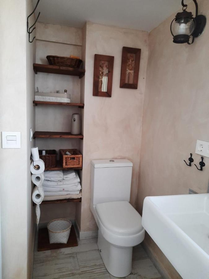 Un Apartamento Vacacional Con Detalles De Un Hogar 마리나데알자라프 외부 사진